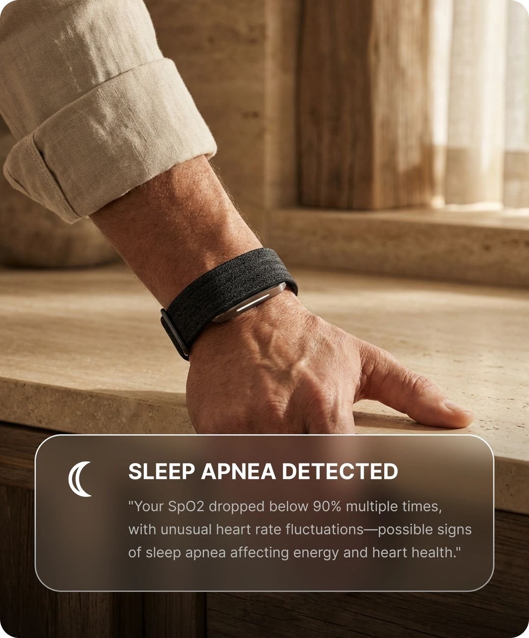 Hulme Band on wrist with a health alert shown in the companion app